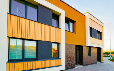 Apartment in residential building exterior. Housing structure at blue modern house of Europe. Rental home in city district on summer. Architecture for business property investment, Vilnius, Lithuania.