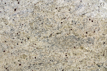 White marble rock texture with dark red minerals