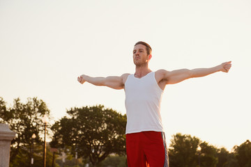 Handsome Caucasian man portrait while resting during a workout outdoors at the National Mall in Washington DC - 313156090