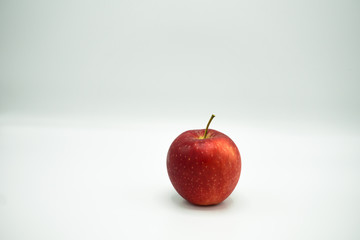 ripe red apple on white background