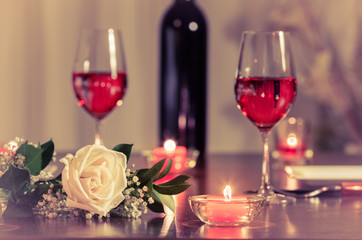Romantic candle light dinner in a restaurant setting. 