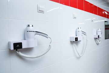  wall-mounted hair dryer for drying hair in a common shower