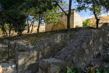 Stone steps lead to Armenian fountain (Karaite fountain) was built   in 16th century in Feodosia,...
