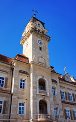 Fototapeta na wymiar Town Hall in town Leibnitz in Styria in Austria. Street architecture. Blue sky on the background.