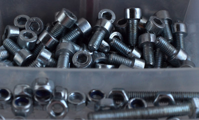 Tool box of screws, anchors, nails, bolts. tool set of dowels, tool kit. Nails, bolts, screws, nuts