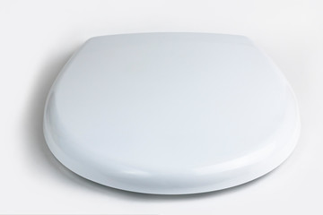 on a white background, a toilet lid. close-up. isolation.