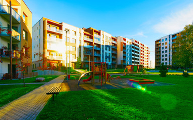 Fototapeta na wymiar Apartment in residential building exterior. Housing structure at blue modern house of Europe. Rental home in city district on summer. Architecture for business property investment, Vilnius, Lithuania.