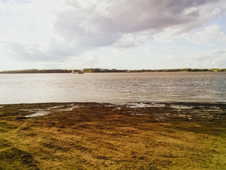 The sandy shore of the river. Northern rivers of Siberia.