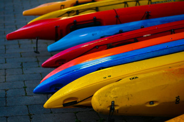 colorful kayaks on the beach