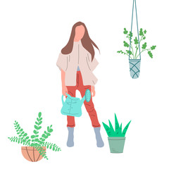 Girl watering flowers in a pot. Creating favorable conditions in a greenhouse, room or public premises for growing indoor plants.