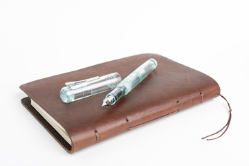 Brown Leather Journal And Green Glass Fountain Pen