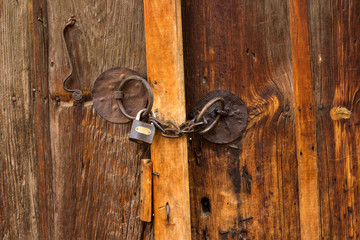 This is an old brown wooden door from a village in Turkey
