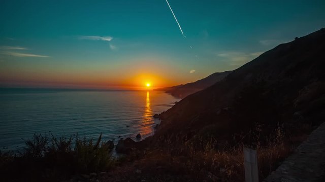 Hyper lapse of Sun setting over mountainous region in Big Sur. Beautiful coastline of California. 