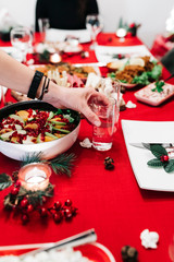 Christmas dinner table with traditional Turkish Cuisine food and red new year concept. 