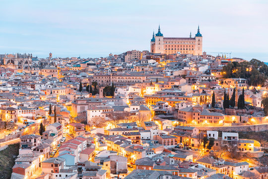 Aerial view of illuminated city at dawn, Toledo, Spain