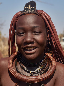 Portrait of a Himba woman in her traditional style, Opuwo, Namibia