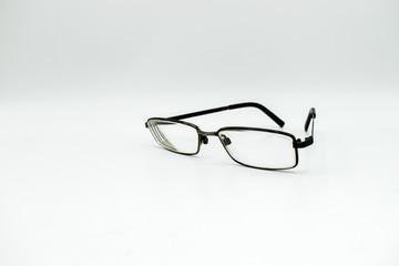 old glasses isolated on white background