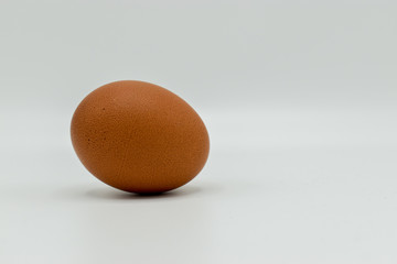 Organic chicken egg isolated on white background