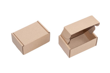 Two open and closed brown cardboard boxes isolated on white background