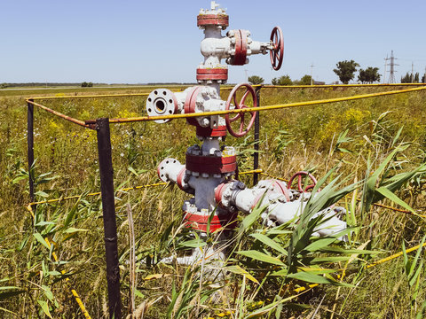 Well for oil and gas production. Oil well wellhead equipment. Oil production