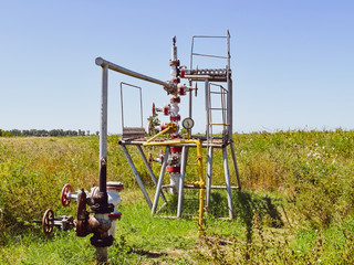 Well for oil and gas production. Oil well wellhead equipment. Oil production