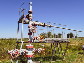 Well for oil and gas production. Oil well wellhead equipment. Oil production