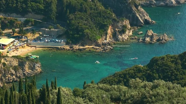 View from above on Paleokastritsa bay in a sunny day, Corfu island, Greece. ProRes 422HQ 10 Bit mov.