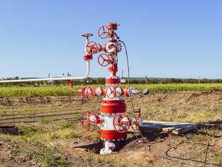 Well for oil and gas production. Oil well wellhead equipment. Oil production