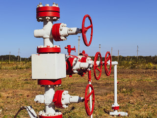 Well for oil and gas production. Oil well wellhead equipment. Oil production