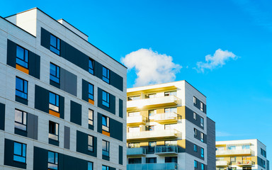 Apartment in residential building exterior. Housing structure at blue modern house of Europe....