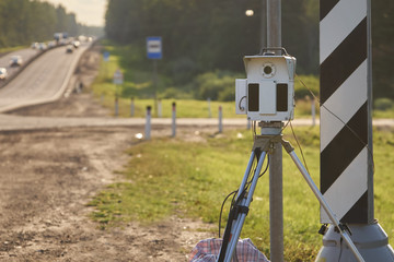 Mobile speed camera device standing on highway in Russia