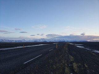 Picturesque winter landscape of Iceland. The perfect road to perspective