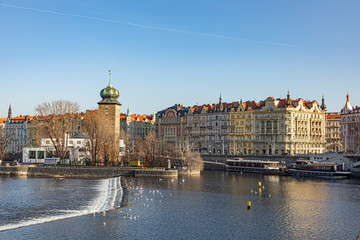 skyline of Prague with river Vltava and promenade