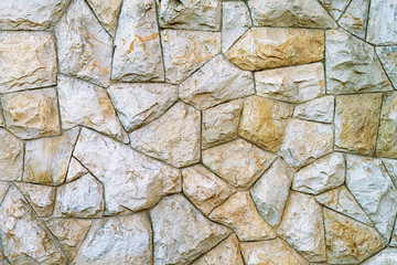 Background of a stone wall texture. Beautiful masonry