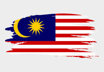 Flag of Malaysia. Brush painted Flag of Malaysia. Hand drawn style illustration with a grunge effect and watercolor. Flag of Malaysia with grunge texture. Vector illustration.