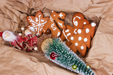 Christmas decorations and cookies in a paper box