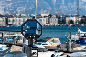 Tourist binoculars on the shores of Lake Geneva, Geneva, Switzerland