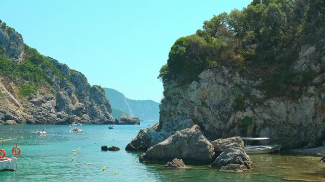 View on Paleokastritsa bay in a sunny day, Corfu island, Greece. ProRes 422HQ 10 Bit mov.