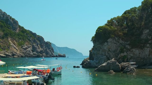 View on Paleokastritsa bay in a sunny day, Corfu island, Greece. ProRes 422HQ 10 Bit mov.
