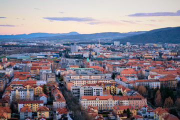 Fototapeta na wymiar Romantic panoramic cityscape in Maribor in Slovenia in Lower Styria in Europe. Panorama of evening City in spring in Slovenija. Slovenian town in summer. Travel destination