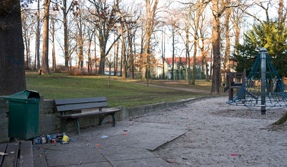 Altenburg / Germany - January 2020: Fireworks packaging waste on the edge of a public children’s playground on New Year's afternoon