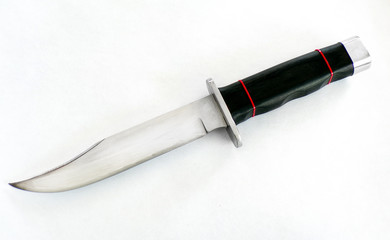 Isolated hunting knife. Polished Bowie knife.