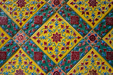 Ancient Thai pattern on wall in Thailand Buddha Temple , Asian Buddha style art