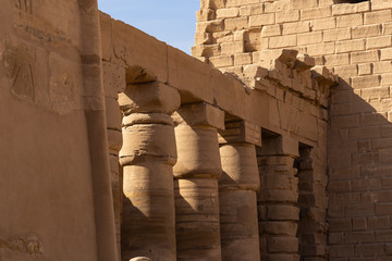 Luxor Governorate, Egypt, Karnak Temple, complex of Amun-Re. Embossed hieroglyphics on columns and...