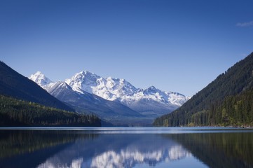 Fototapeta na wymiar Calm Duffy Lake and snow covered mountains