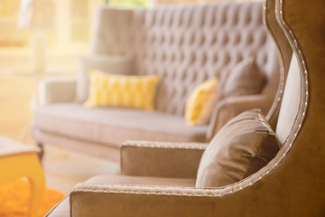 Obraz na płótnie Canvas close up of soft fabric pillow decoration on beautiful sofa in living room home design concept