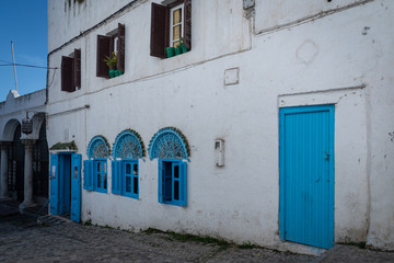 Fototapeta na wymiar Beautiful white facade in Tangier's Medina, Morocco