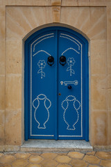 Traditional blue door in Kairouan, Tunisia