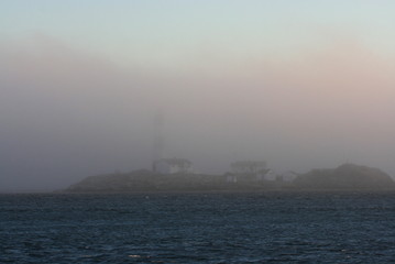 Foggy coastal lighthouse
