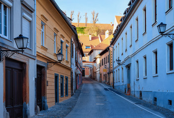 Cityscape with street lanterns in the center of Ptuj old town in Slovenia.